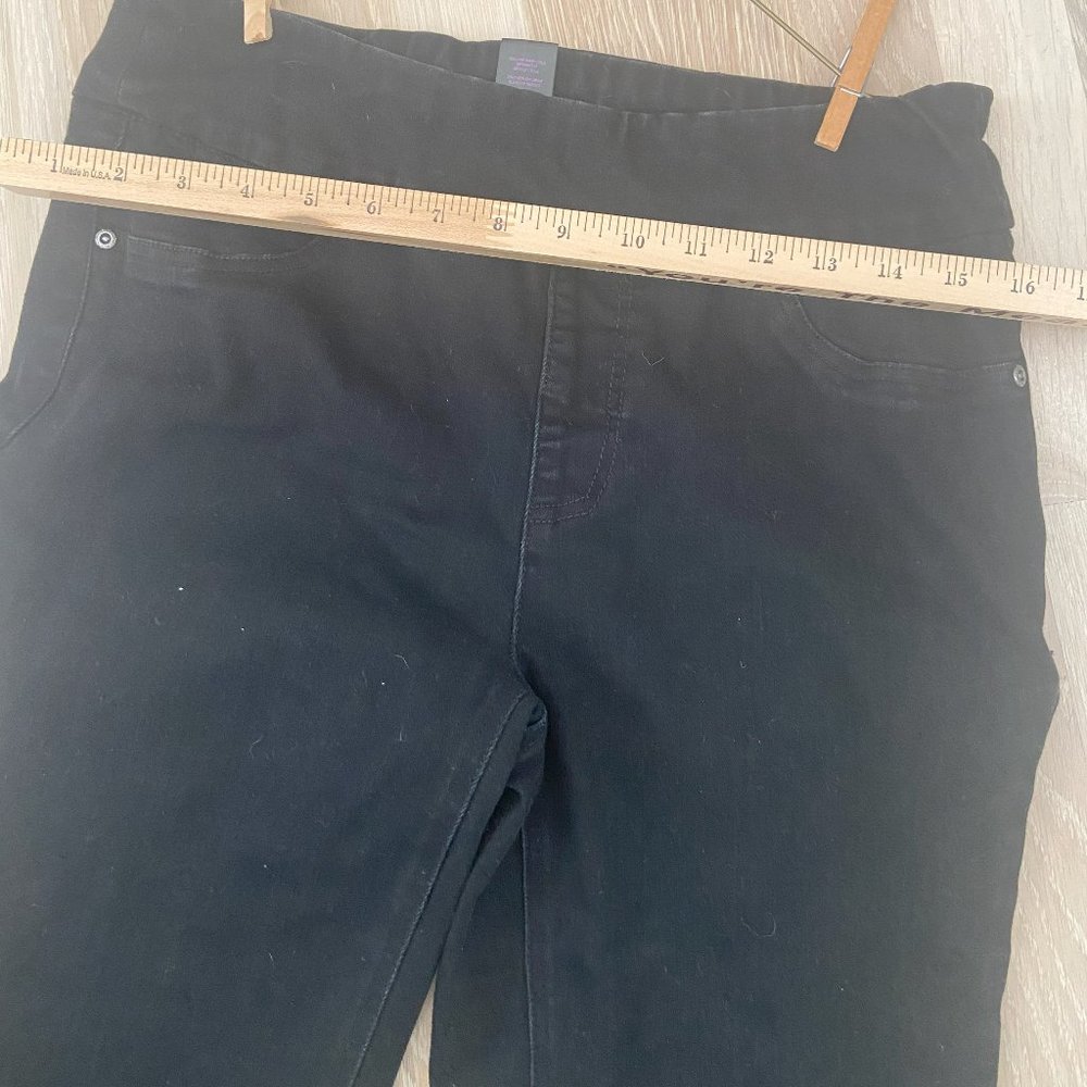 Women's black pull-on straight leg jeans with rough hem